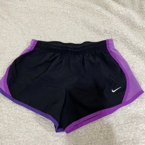 Nike kids athletic shorts black and purple